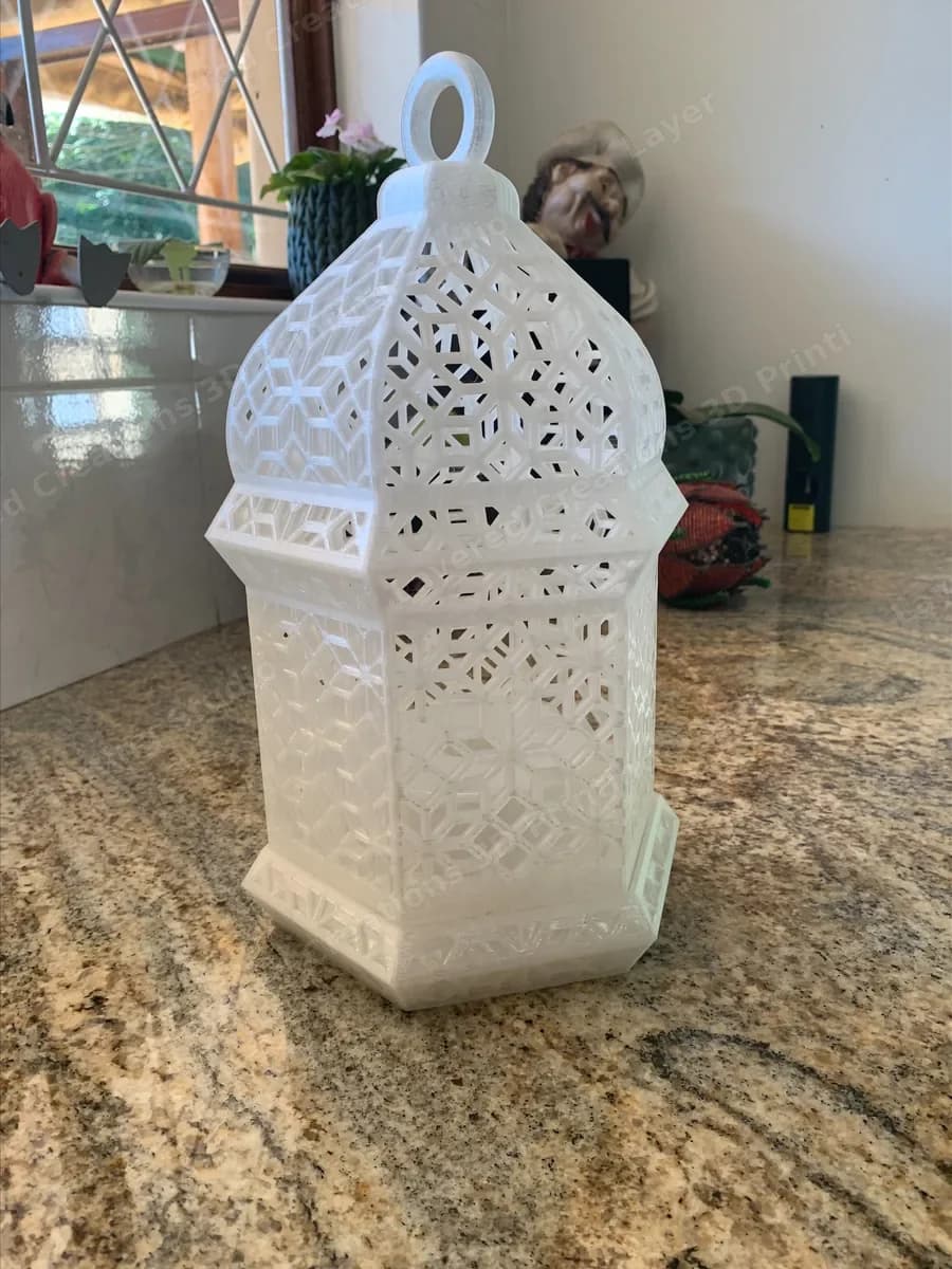 The larger lamp printed in translucent filament, glowing when lit