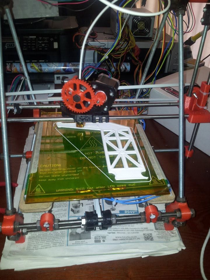 The original home-built 3D printer at work